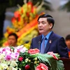 Chủ tịch Tổng Liên đoàn lao động Việt Nam Bùi Văn Cường trình bày Báo cáo của Ban Chấp hành Công đoàn khóa 11. (Ảnh; TTXVN)