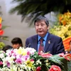 Ông Trần Thanh Hải, Phó Chủ tịch Tổng Liên đoàn Lao động Việt Nam trình bày chỉ tiêu phấn đấu trong nhiệm kỳ 2018-2023. (Ảnh: TTXVN)