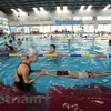 Dạy bơi cho trẻ em. (Ảnh minh họa: PV/Vietnam+)