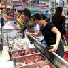 Nhu cầu thịt lợn được dự báo sẽ tăng trong ba tháng tới. (Ảnh: PV/Vietnam+)