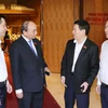 Thủ tướng Nguyễn Xuân Phúc với các đại biểu Quốc hội. (Ảnh: Thống Nhất/TTXVN)