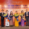 Hội thảo tổng kết dự án “Xây dựng mô hình phòng ngừa và ứng phó với bạo lực đối với phụ nữ và trẻ em gái tại Việt Nam”. (Ảnh: PV/Vietnam+)