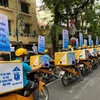 Trên khắp cả nước, gần 700 đội truyền thông lưu động bằng phương tiện ô tô, xe máy ra quân tuyên truyền về bảo hiểm xã hội, bảo hiểm y tế. (Ảnh: PV/Vietnam+)