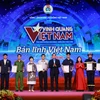 Vinh quang Việt Nam vinh danh các tập thể, cá nhân điển hình cho phong trào thi đua yêu nước. (Ảnh: PV/Vietnam+)