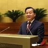 Phó Thủ tướng Lê Minh Khái trình bày Báo cáo đánh giá bổ sung kết quả thực hiện kế hoạch phát triển kinh tế-xã hội và ngân sách Nhà nước năm 2022; tình hình thực hiện kế hoạch phát triển kinh tế-xã hội và ngân sách Nhà nước những tháng đầu năm 2023. (Ảnh: