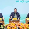 Thủ tướng Phạm Minh Chính đối thoại với nông dân. (Ảnh: Dương Giang/TTXVN)