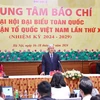 Chủ tịch Ủy ban trung ương Mặt trận Tổ quốc Việt Nam khoá X Đỗ Văn Chiến trả lời phóng viên tại họp báo sau Đại hội. (Ảnh: TTXVN)