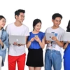 Người trẻ Việt dùng mạng xã hội hàng ngày, hàng giờ, gần như mọi hoạt động, hành vi ứng xử hay thông tin đều được người dùng đăng tải lên đó. (Ảnh: PV/Vietnam+)