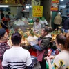 [Photo] 'Chợ nhà giàu' Hà Nội tấp nập trong ngày Rằm tháng Giêng