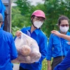 Đoàn thanh niên tỉnh Bắc Giang hỗ trợ lương thực, thực phẩm cho Thành phố Hà Nội chống dịch COVID-19. (Ảnh: Minh Hiếu/Vietnam+)