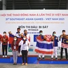 Lễ trao huy chương bộ môn bi sắt SEA Games ở nội dung đôi hỗn hợp, bộ ba hỗn hợp nam nữ. (Ảnh: Minh Hiếu/Vietnam+)