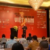 Ông Nguyễn Đại Hoàng, Trưởng ban tổ chức chương trình "Xếp xe kỷ lục hình bản đồ Việt Nam" phát biểu tại sự kiện. (Ảnh: PV/Vietnam+)