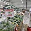 Một số bê bối gần đây về rau sạch VietGAP đã khiến người tiêu dùng ái ngại khi đi mua sắm. (Ảnh minh họa: PV/Vietnam+)