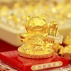 [Photo] Các sản phẩm vàng linh vật mèo thu hút trong ngày vía Thần Tài