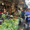 Giá các mặt hàng rau xanh, thịt lợn rục rịch tăng. (Ảnh minh hoạ: PV/Vietnam+)