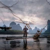 Tác phẩm "Đánh cá sông Li, Trung Quốc" của tác giả Phạm Trung Kiên. (Nguồn ảnh: BTC)