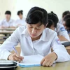 Thí sinh dự thi tốt nghiệp trung học phổ thông năm 2013. (Ảnh: Quý Trung/TTXVN)