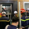 Hiện trường vụ sập thang máy làm 2 người tử vong tại Hà Nội. (Ảnh: PV/Vietnam+)