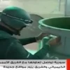 Thanh sát viên Tổ chức cấm vũ khí hóa học kiểm tra tại một địa điểm chứa vũ khí hóa học tại Syria ngày 19/10. Ảnh chụp qua truyền hình. (Nguồn: AFP/TTXVN)