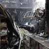 [Photo] Cửa hàng tạp hóa ở TP.HCM cháy rụi, 2 người chết