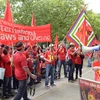 Dòng người biểu tình phản đối Trung Quốc rực đỏ tại Hannover