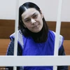 Bobokulova mỉm cười khi xuất hiện lần đầu tại tòa án Nga (Nguồn: Daily Mail)