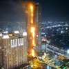 Cao ốc New Soho đã bất ngờ bốc cháy. (Nguồn: Jakarta Globe)