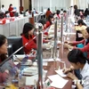Fitch nâng hạng đánh giá tín nhiệm nợ dài hạn của Việt Nam