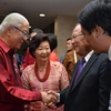 Bộ trưởng Hoàng Anh Tuấn tiếp kiến Tổng thống Singapore Tony Tan Keng Yam (trái). (Ảnh: Thanh Liêm/Vietnam+)