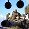 Xe tăng quân đội Israel triển khai trên Cao nguyên Golan. (Ảnh: blogs.ft.com)