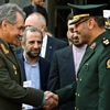 Bộ trưởng Sergei Shoigu và người đồng cấp Iran Hossein Dehqan. (Ảnh: itar-tass.com)