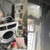 Hiện trường vụ cháy chỉ gây thiệt hại một máy giặt đã qua sử dụng, không có thiệt hại về người. (Ảnh: Công an quận Nam Từ Liêm) 