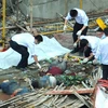 Vụ tai nạn thang máy ở Vũ Hán (Trung Quốc) làm 19 người thiệt mạng hồi tháng 9/2012. (Ảnh: english.caixin.com)