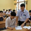 Thí sinh làm thủ tục dự thi tại điểm thi Đại học Nông lâm, Bắc Giang. (Ảnh: Đồng Thuý/TTXVN)