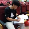 Thi sinh làm thủ tục xét tuyển đại học 2016 (Ảnh: Phạm Mai/Vietnam+)