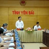 Thứ trưởng Bộ Giáo dục và Đào tạo Nguyễn Hữu Độ làm việc với Ban chỉ đạo thi tỉnh Yên Bái. (Ảnh: PV/Vietnam+)