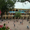 Học sinh Trường Tiểu học Thanh Liệt trở lại trường sau kỳ nghỉ Tết dài vì dịch COVID-19. (Ảnh: Phạm Mai/Vietnam+)