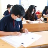 Thí sinh dự thi tốt nghiệp trung học phổ thông năm 2020, lấy kết quả xét tuyển vào các trường đại học. (Ảnh: PV/Vietnam+)