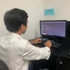 Lê Đình Văn, một công nhân may tại Quảng Nam đã học tại FUNiX để chuyển nghề và hiện là một lập trình viên tại FPT Software. (Ảnh: PV/Vietnam+)