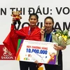 Phương Thảo và huấn luyện viên trong niềm vui giành huy chương vàng SEA Games 31. (Ảnh: FTP)