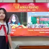 Học sinh bắt đầu năm học mới bằng lễ khải giảng qua màn hình máy tính hoặc trước tivi. (Ảnh: CTV/Vietnam+)