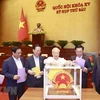Tổng Bí thư Nguyễn Phú Trọng và các lãnh đạo Đảng, Nhà nước bỏ phiếu tín nhiệm. (Ảnh: Doãn Tấn/TTXVN)