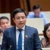 Bộ trưởng Bộ Giao thông Vận tải Nguyễn Văn Thắng giải trình. (Ảnh: CTV/Vietnam+)
