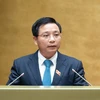 Bộ trưởng Bộ Giao thông Vận tải Nguyễn Văn Thắng trình bày tờ trình dự thảo Luật Đường bộ sửa đổi. (Ảnh: CTV/Vietnam+)