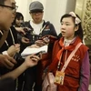 Phóng viên nhí Sun Luyuan khiến các quan chức Trung Quốc toát mồ hôi (Nguồn: AFP)