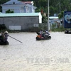 Chính quyền địa phương cần giúp người dân chủ động đối phó với bão lũ (Ảnh: Viết Ý - TTXVN)