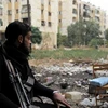 Một thành viên phe nổi dậy Syria ở Aleppo, ảnh chụp hôm 7/11 (Nguồn: AFP)
