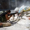 Một chiến binh thuộc lực lượng phiến quân Syria (Nguồn: AFP/TTXVN)