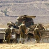  Binh sĩ Israel tại khu vực huấn luyện sát biên giới Syria trên cao nguyên Golan ngày 10/10. AFP/ TTXVN