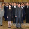 Ông Kim Jong-Un và vợ dự lễ tưởng niệm 2 năm ngày mất của cố lãnh tụ Kim Jong-Il (Nguồn: TTXVN)